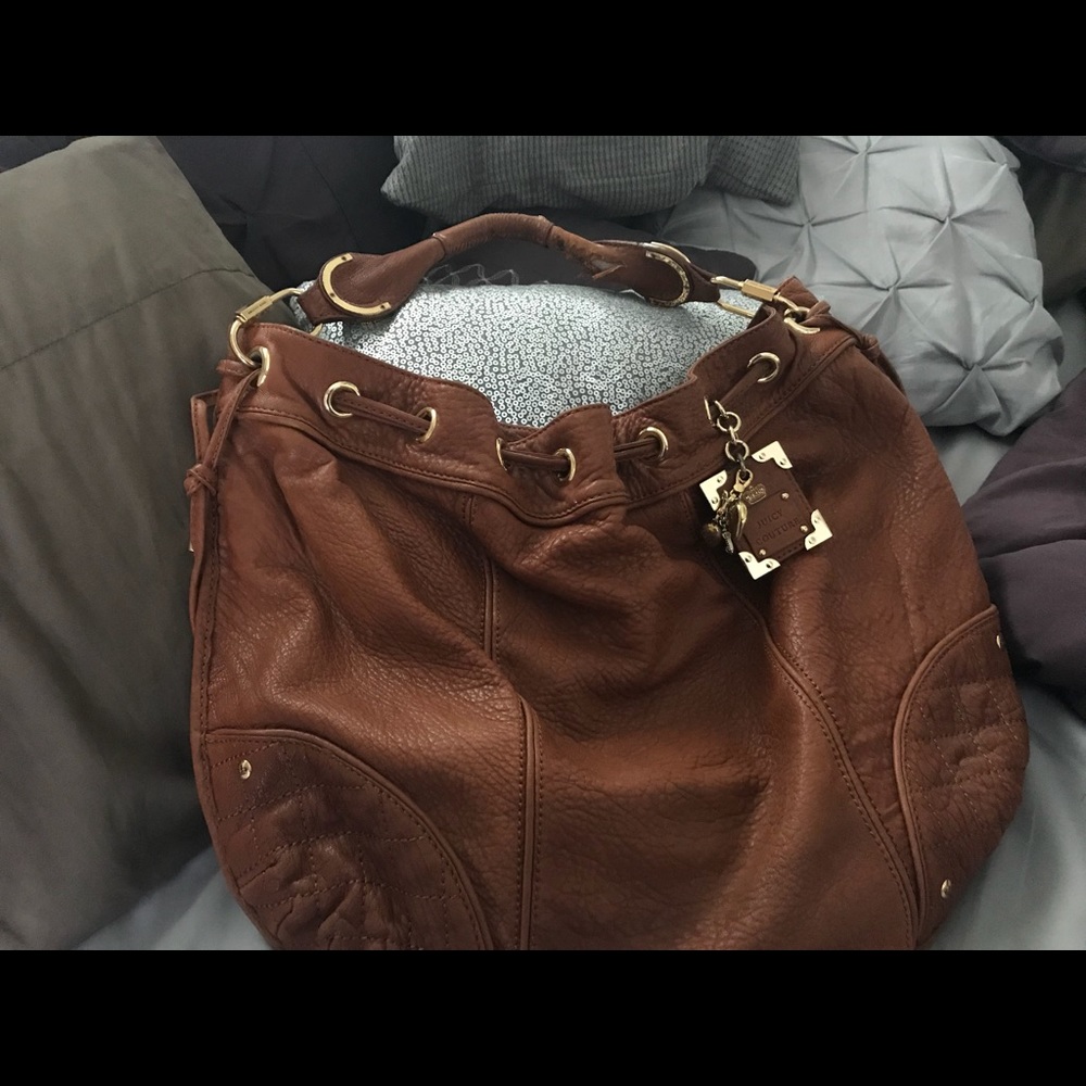 Slightly used leather juicy couture purse